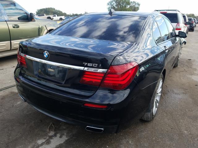 Photo 3 VIN: WBAYA8C57FD825621 - BMW 750I 