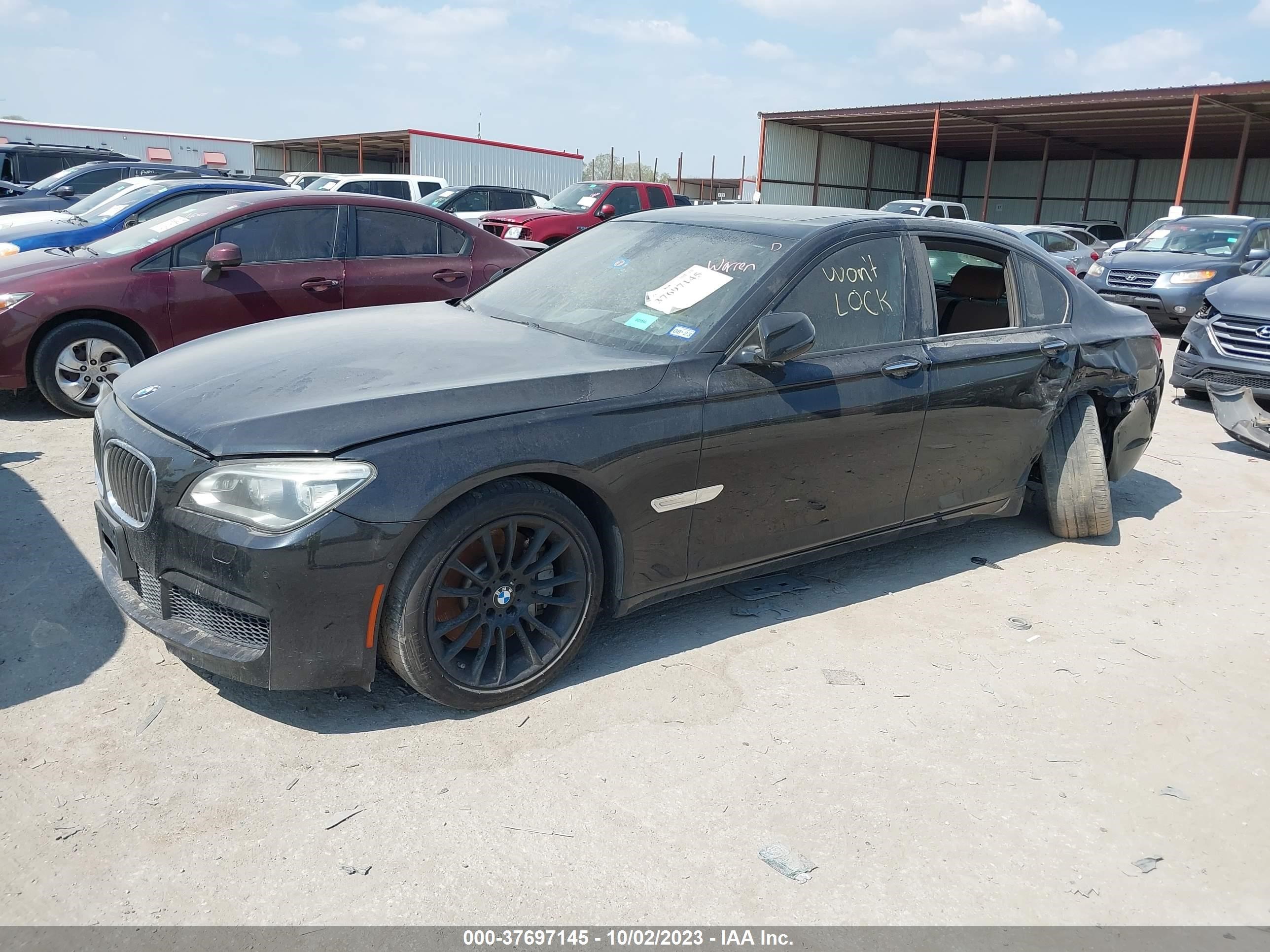 Photo 1 VIN: WBAYA8C57FD825859 - BMW 7ER 