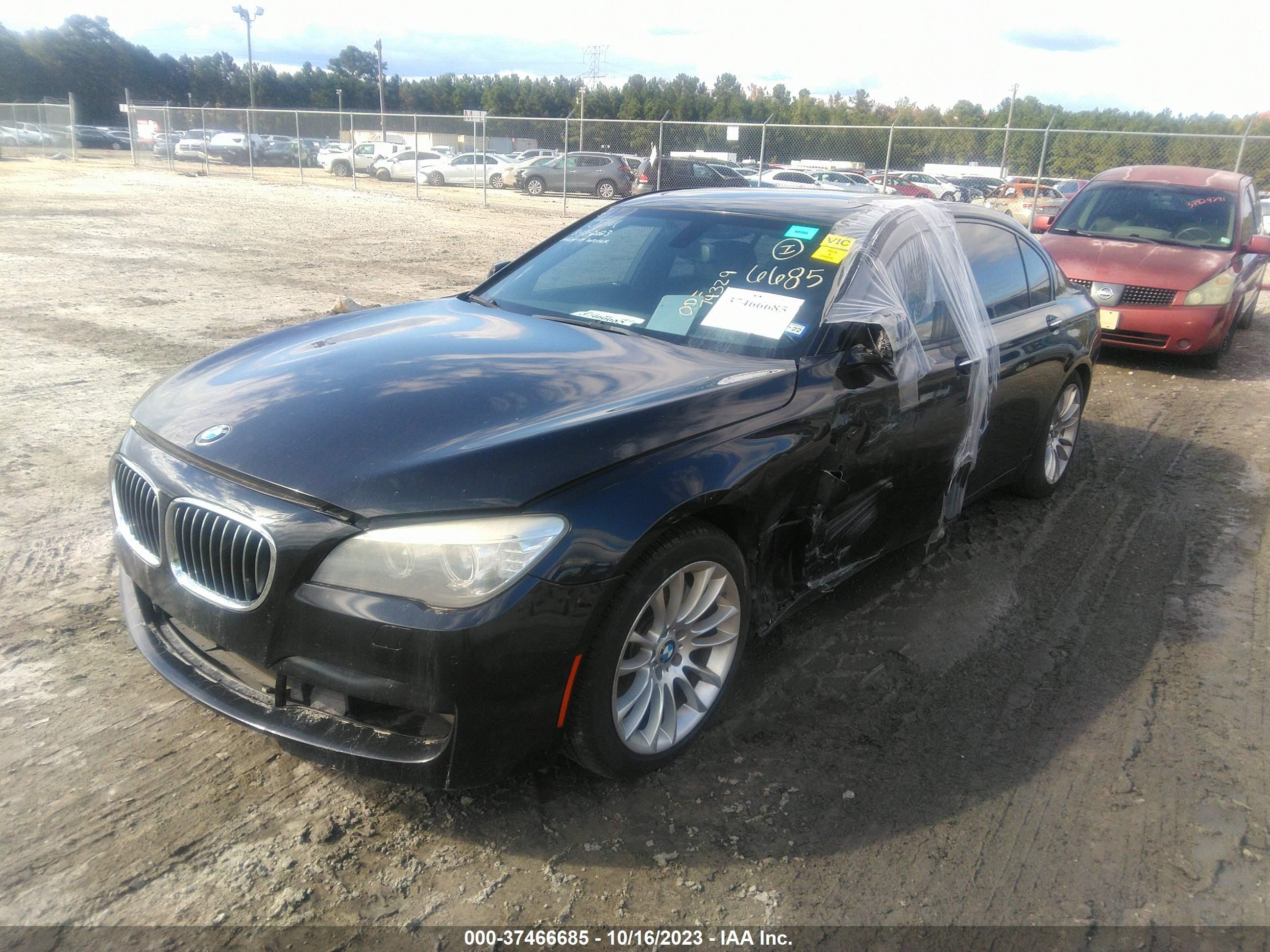 Photo 1 VIN: WBAYE4C54ED138429 - BMW 7ER 