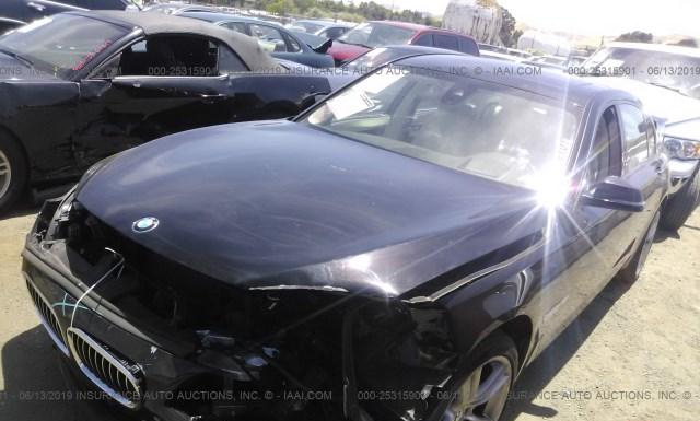 Photo 1 VIN: WBAYE8C52FD780768 - BMW 750I 