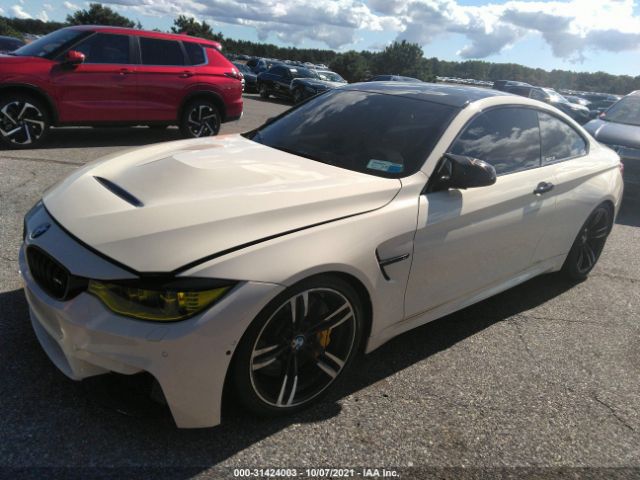 Photo 1 VIN: WBS3R9C50GK338634 - BMW M4 