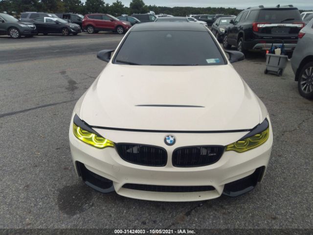 Photo 5 VIN: WBS3R9C50GK338634 - BMW M4 