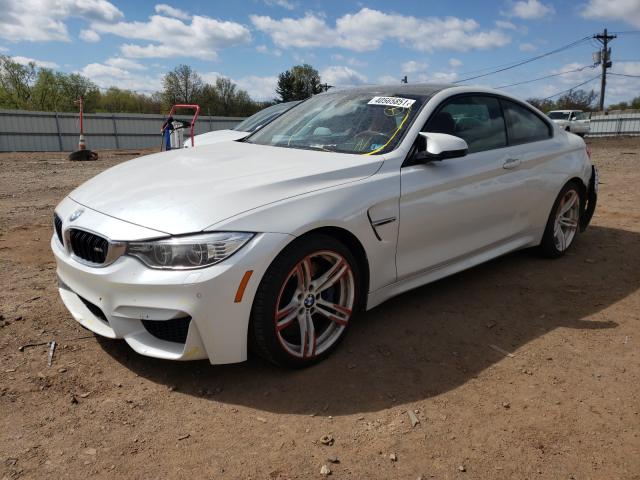 Photo 1 VIN: WBS3R9C50GK338780 - BMW M4 