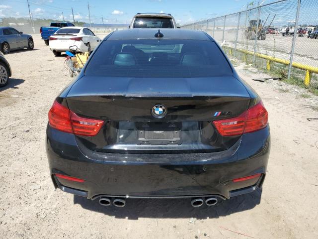 Photo 5 VIN: WBS3R9C55GK339049 - BMW M4 