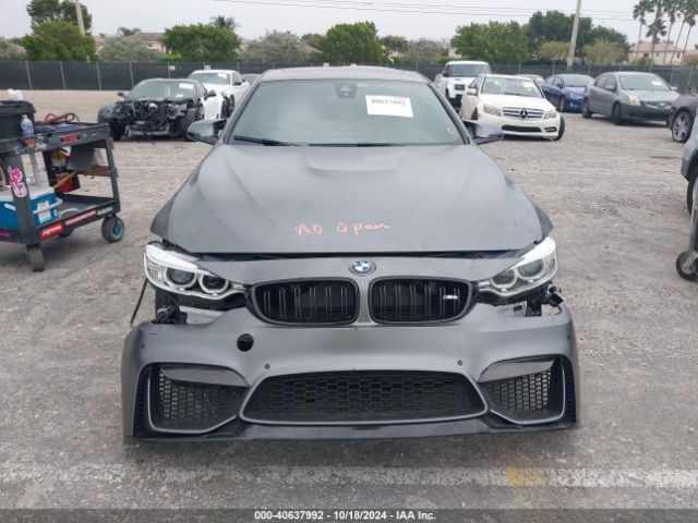 Photo 5 VIN: WBS3R9C55GK708248 - BMW M4 