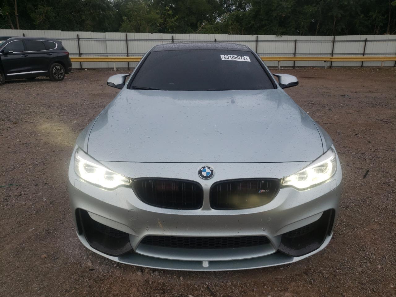 Photo 4 VIN: WBS3R9C56GK335690 - BMW M4 