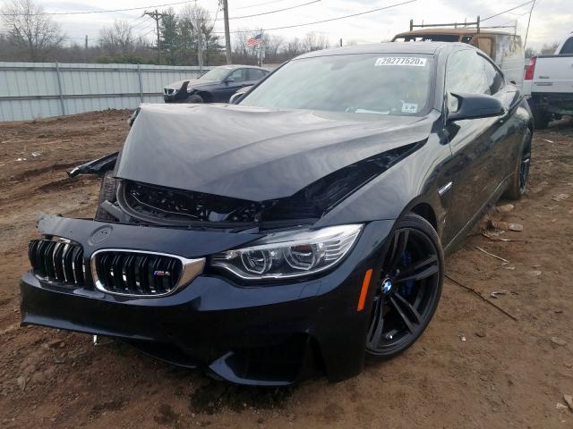 Photo 1 VIN: WBS3R9C57FK332991 - BMW M4 