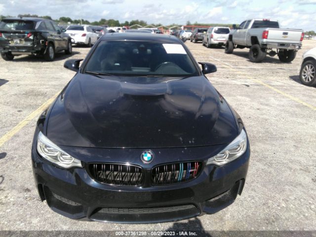 Photo 5 VIN: WBS3R9C57GK337254 - BMW M4 