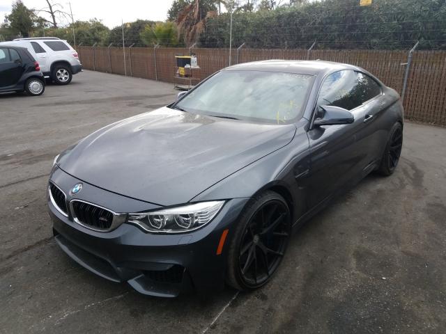 Photo 1 VIN: WBS3R9C5XFK329809 - BMW M4 