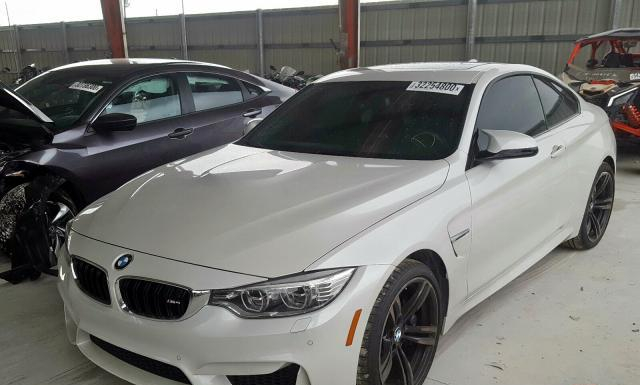 Photo 1 VIN: WBS3R9C5XGK337703 - BMW M4 