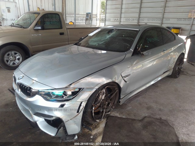 Photo 1 VIN: WBS3R9C5XGK338026 - BMW M4 