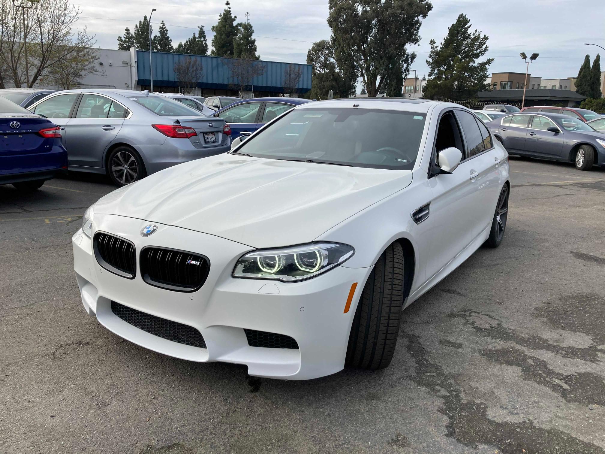 Photo 1 VIN: WBSFV9C54FD594206 - BMW M5 