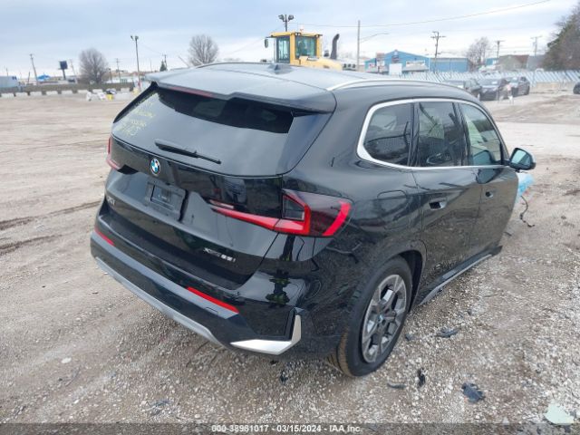 Photo 3 VIN: WBX73EF02P5X62823 - BMW X1 