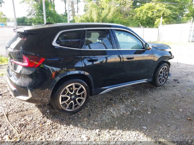 Photo 3 VIN: WBX73EF04P5Y04649 - BMW X1 