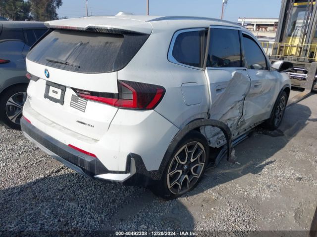 Photo 3 VIN: WBX73EF04R5Y70122 - BMW X1 