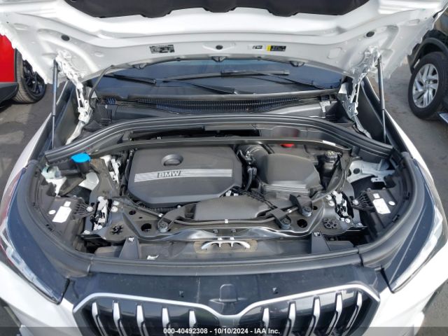 Photo 9 VIN: WBX73EF04R5Y70122 - BMW X1 