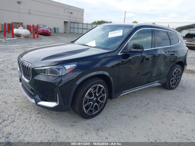 Photo 1 VIN: WBX73EF06P5Y06340 - BMW X1 