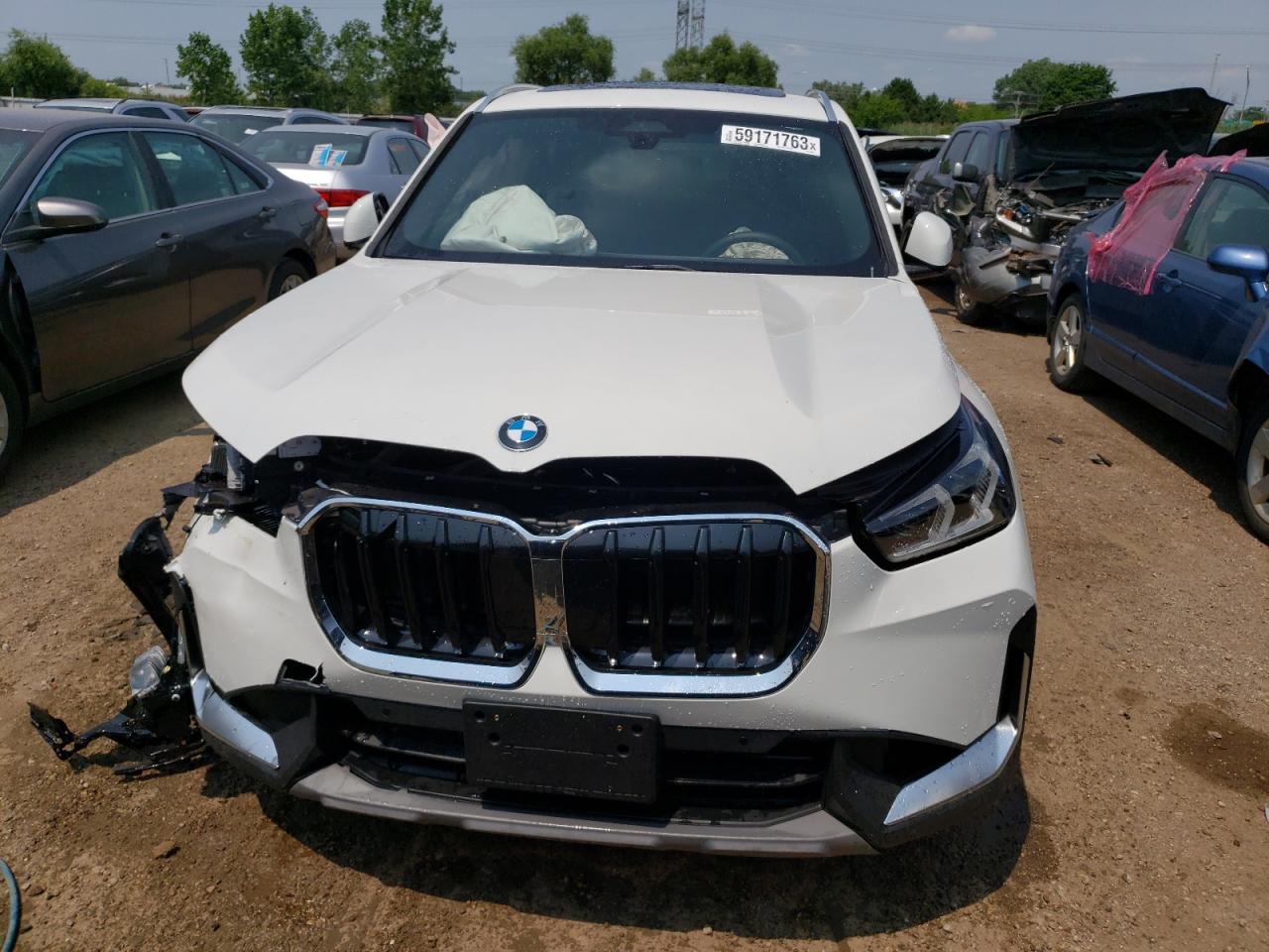 Photo 4 VIN: WBX73EF08P5V87378 - BMW X1 