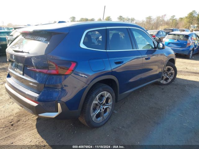 Photo 3 VIN: WBX73EF08P5Y03214 - BMW X1 