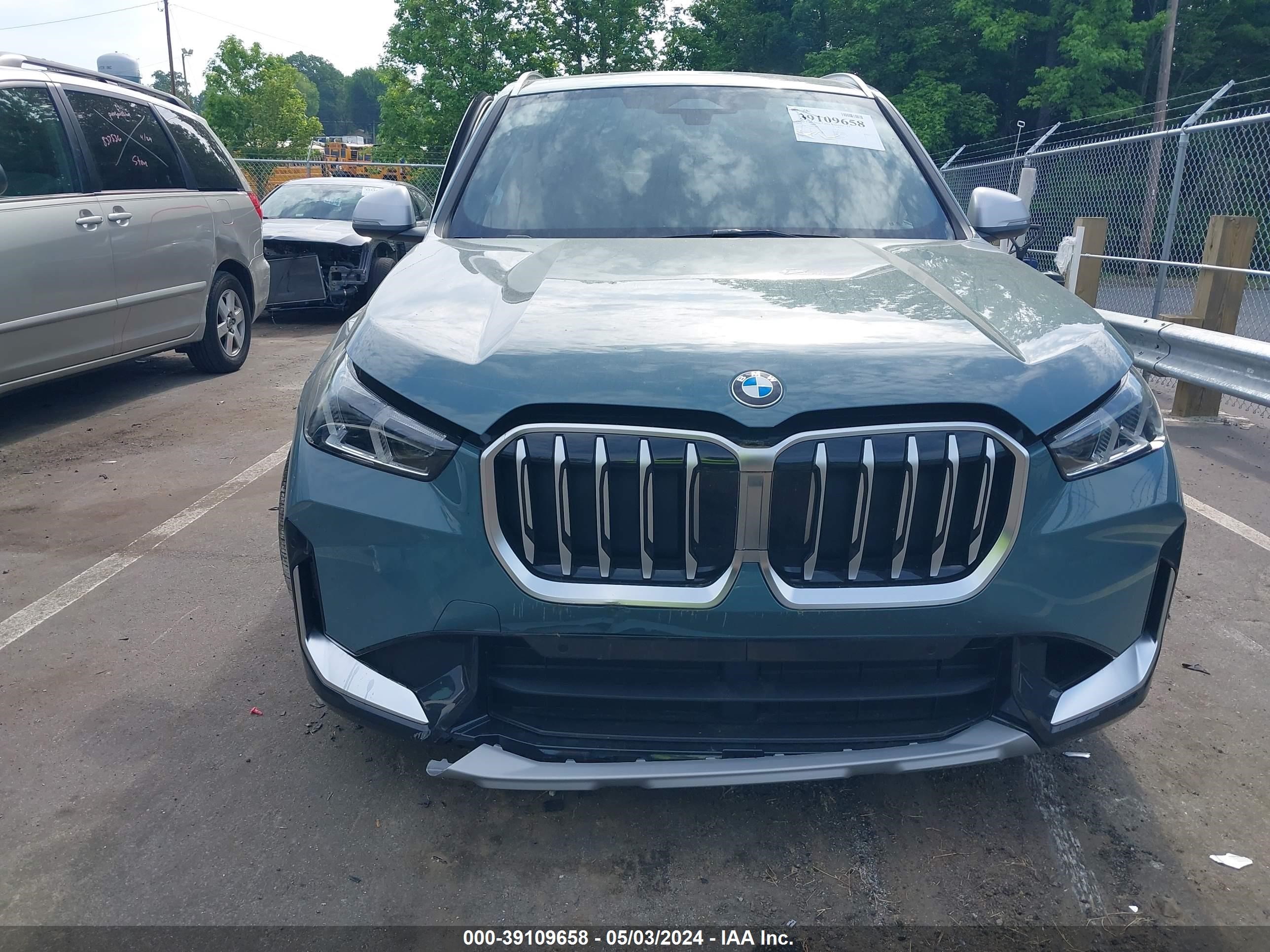 Photo 12 VIN: WBX73EF08R5Y43621 - BMW X1 