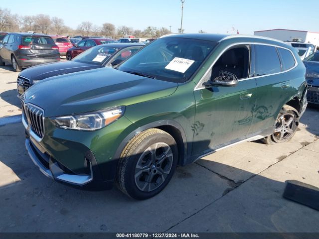 Photo 1 VIN: WBX73EF09P5Y24704 - BMW X1 