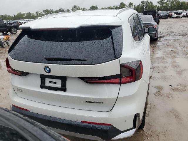 Photo 5 VIN: WBX73EF09R5Y87319 - BMW X1 