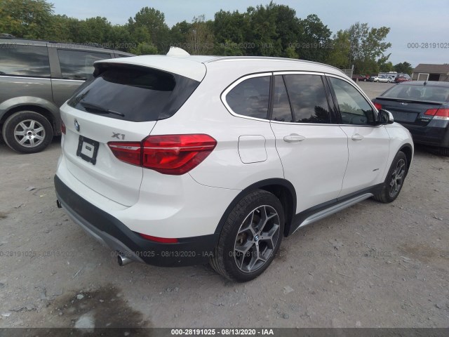 Photo 3 VIN: WBXHT3C30G5E54642 - BMW X1 