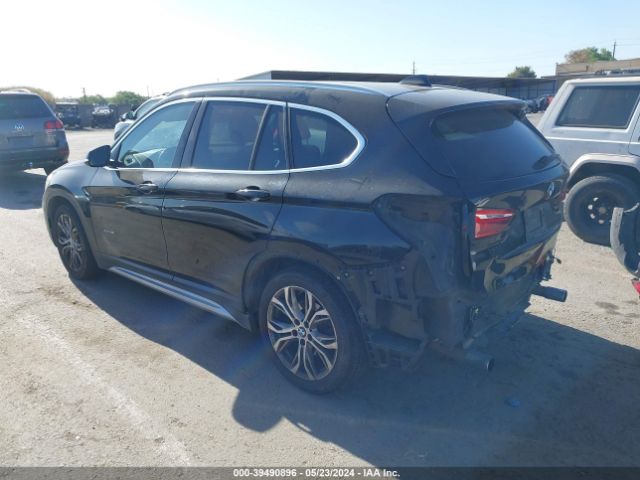 Photo 2 VIN: WBXHT3C30G5E56682 - BMW X1 