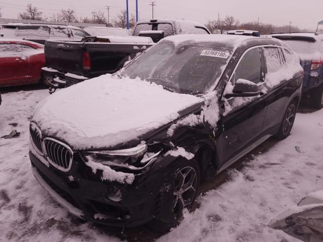 Photo 1 VIN: WBXHT3C30G5F64381 - BMW X1 