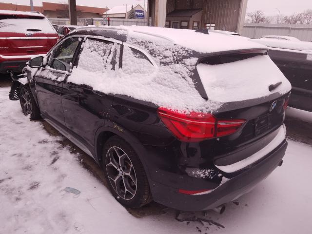 Photo 2 VIN: WBXHT3C30G5F64381 - BMW X1 