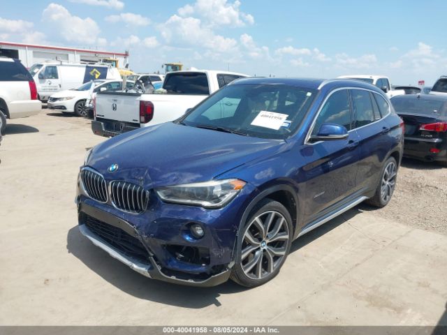 Photo 1 VIN: WBXHT3C30G5F66227 - BMW X1 