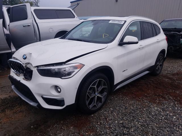 Photo 1 VIN: WBXHT3C30G5F67622 - BMW X1 