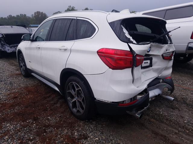 Photo 2 VIN: WBXHT3C30G5F67622 - BMW X1 