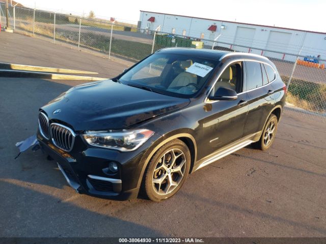 Photo 1 VIN: WBXHT3C30GP881126 - BMW X1 