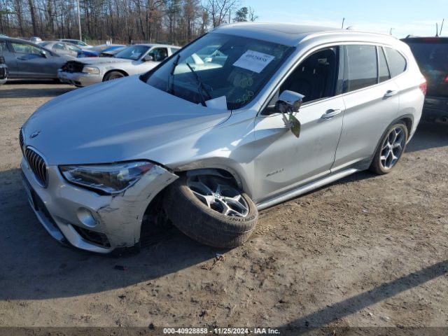 Photo 1 VIN: WBXHT3C30GP881255 - BMW X1 