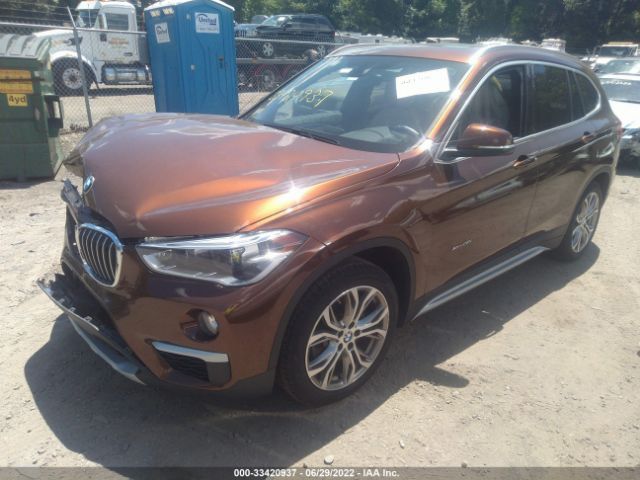 Photo 1 VIN: WBXHT3C30GP883698 - BMW X1 