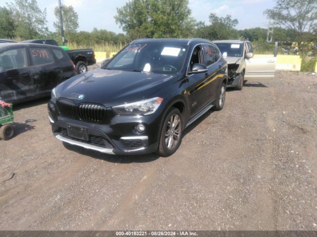 Photo 1 VIN: WBXHT3C30GP884995 - BMW X1 