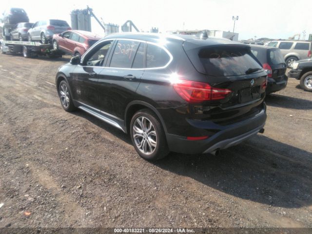 Photo 2 VIN: WBXHT3C30GP884995 - BMW X1 