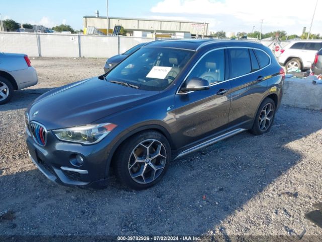 Photo 1 VIN: WBXHT3C30GP886097 - BMW X1 