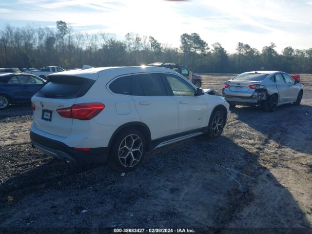 Photo 3 VIN: WBXHT3C30H5F75060 - BMW X1 