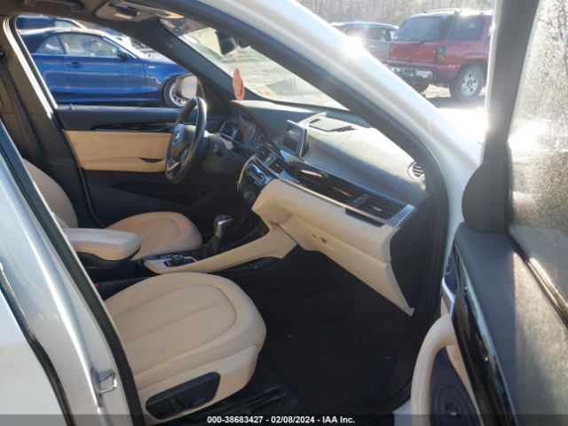 Photo 4 VIN: WBXHT3C30H5F75060 - BMW X1 