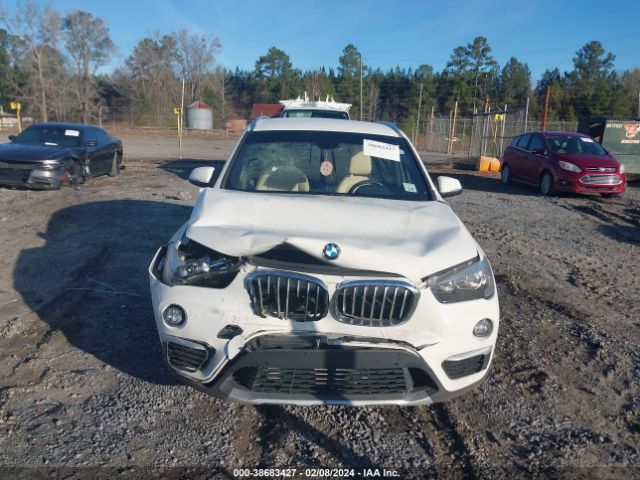 Photo 5 VIN: WBXHT3C30H5F75060 - BMW X1 