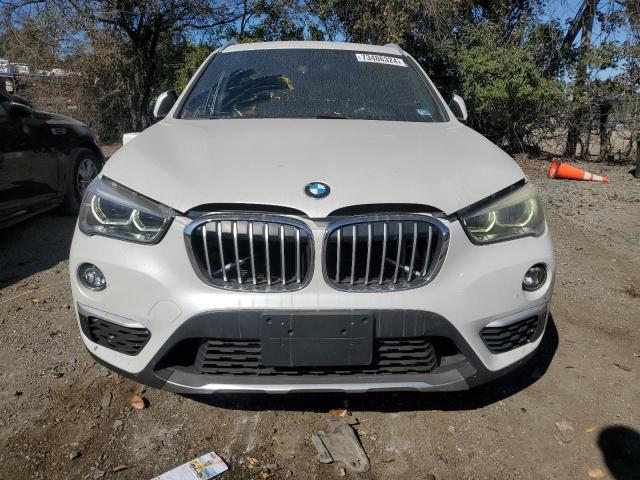 Photo 4 VIN: WBXHT3C30H5F75110 - BMW X1 XDRIVE2 