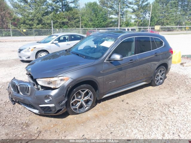 Photo 1 VIN: WBXHT3C30H5F76452 - BMW X1 