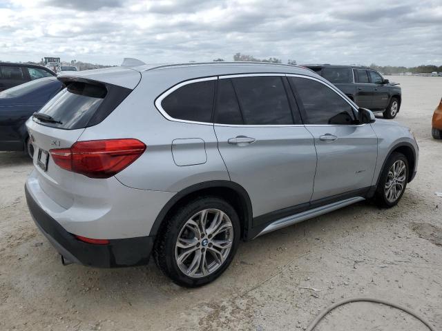 Photo 2 VIN: WBXHT3C30H5F77150 - BMW X1 