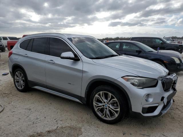 Photo 3 VIN: WBXHT3C30H5F77150 - BMW X1 