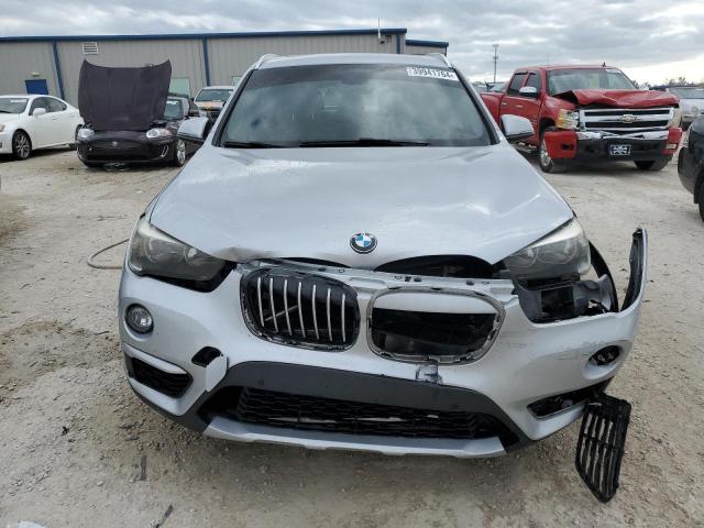 Photo 4 VIN: WBXHT3C30H5F77150 - BMW X1 