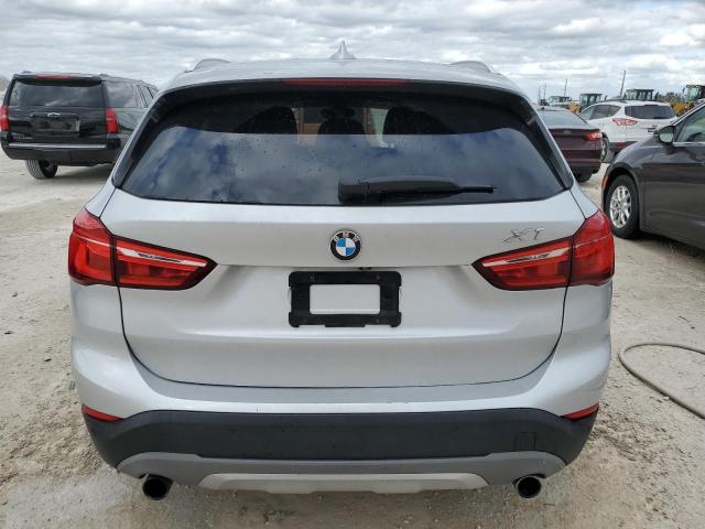 Photo 5 VIN: WBXHT3C30H5F77150 - BMW X1 