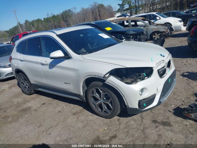 Photo 0 VIN: WBXHT3C30H5F77214 - BMW X1 