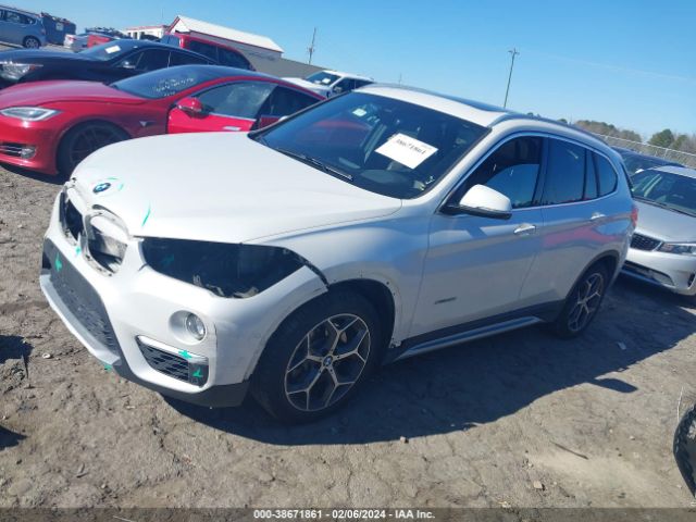 Photo 1 VIN: WBXHT3C30H5F77214 - BMW X1 